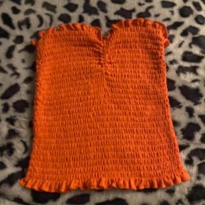 From Rue 21, tub top size xs, red orange coral color, worn only once
